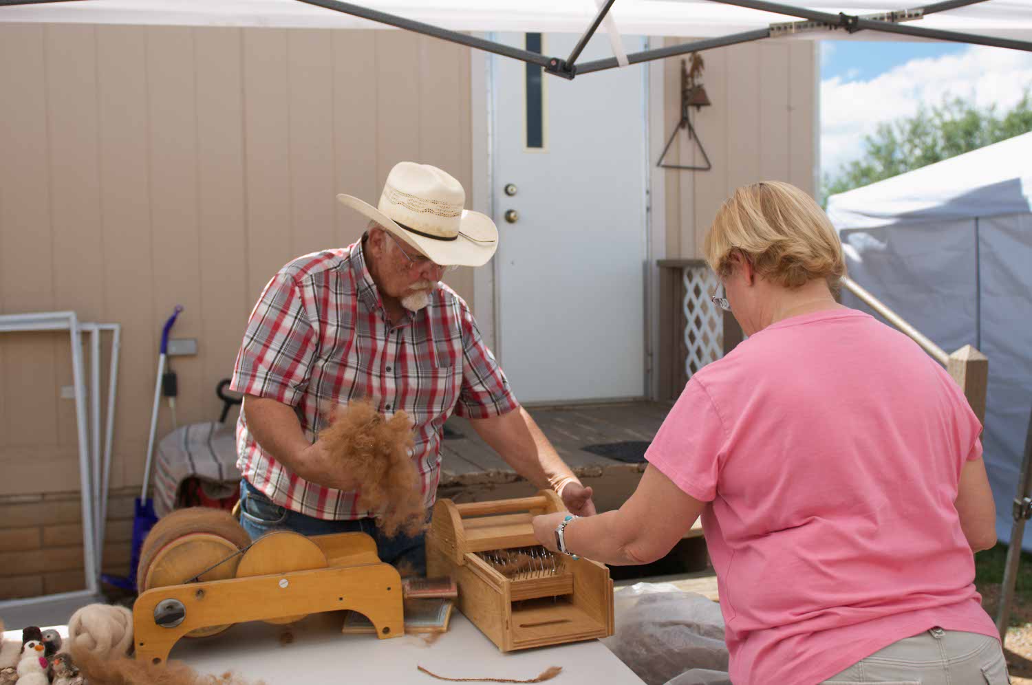 Image: LeRoy demonstrates the fleece picker.