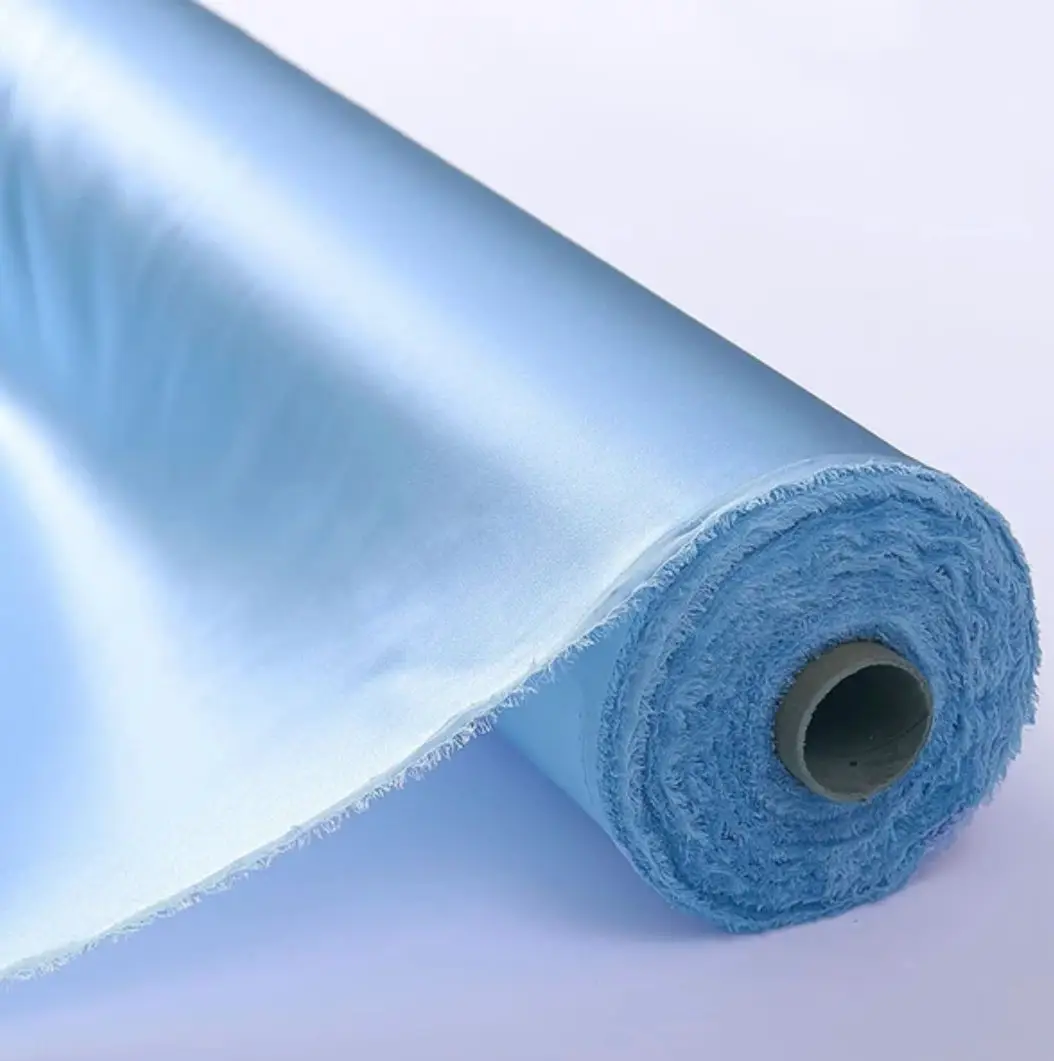 Silk charmeuse fabric on the bolt, baby blue